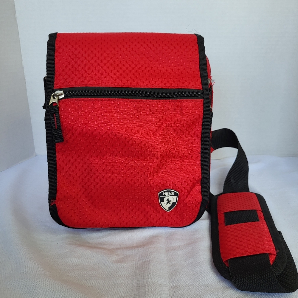 Heys cross body multiple pocket red lightweight travel bag